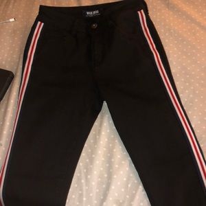 Black pants with white, blue, and red stripes